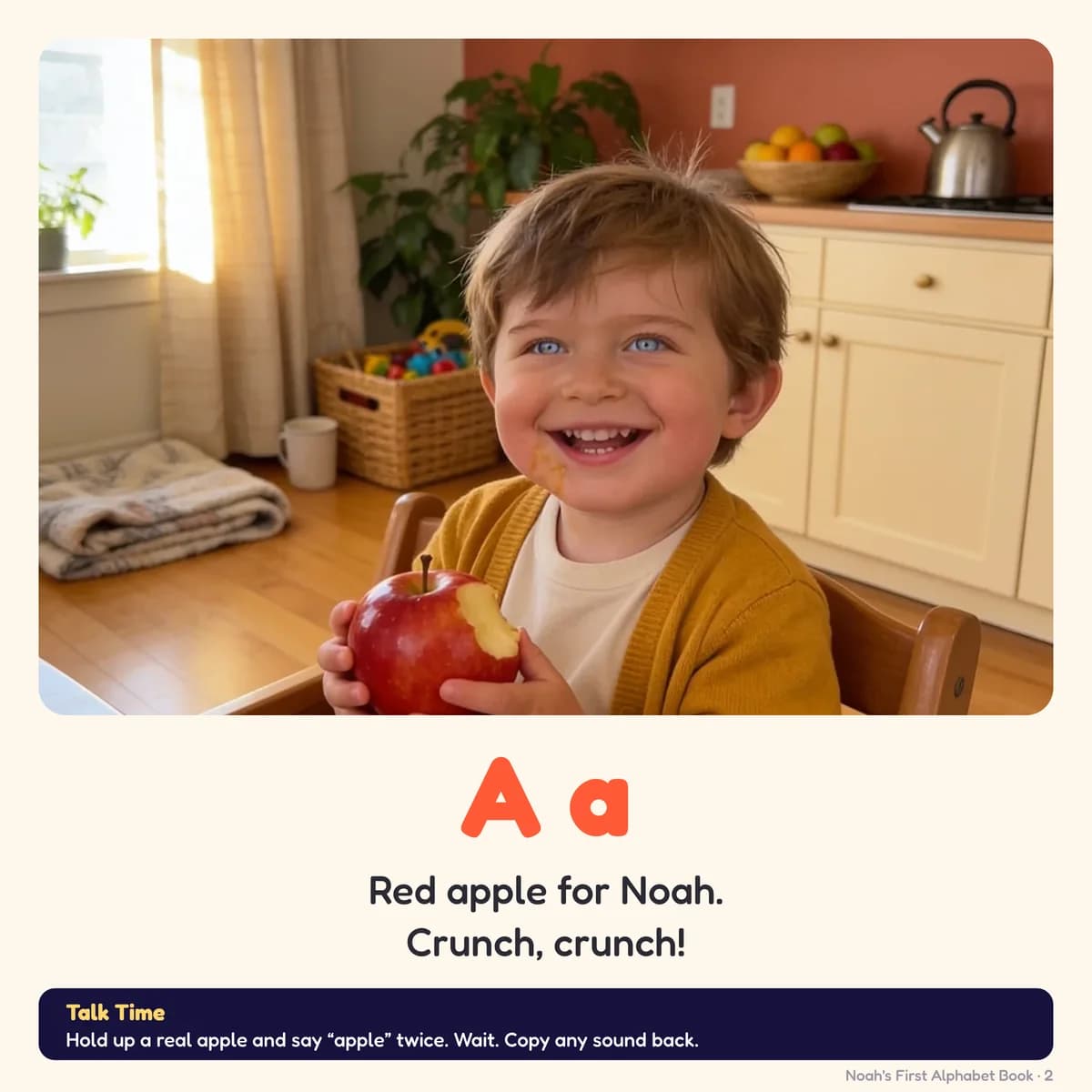 A flashcard page from My First Alphabet Book: Noah in a high chair holding up a shiny red apple with one bite taken out