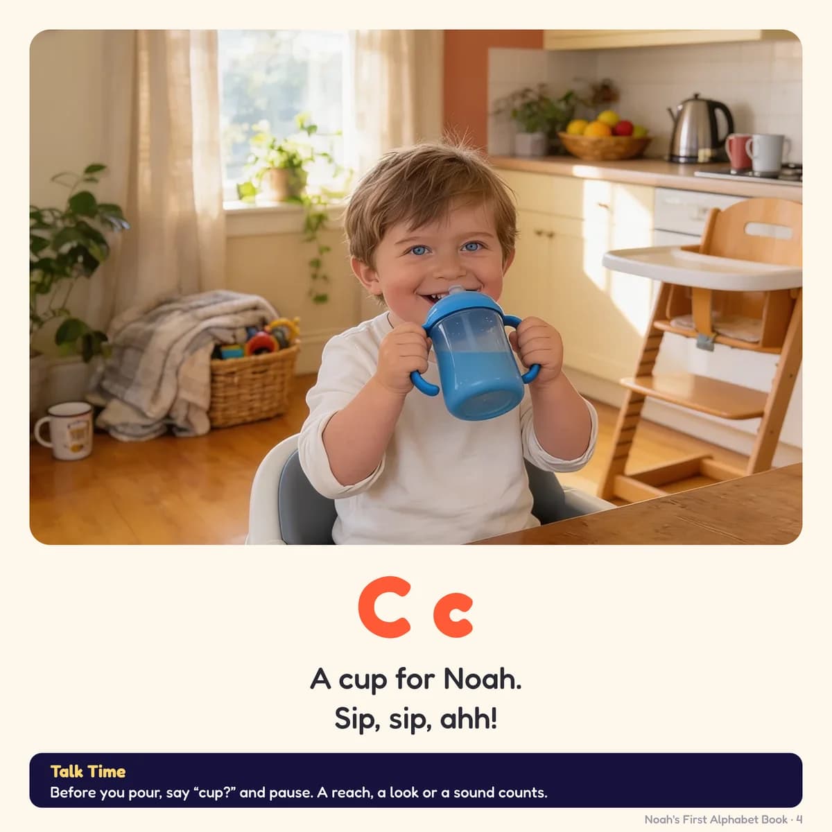 A flashcard page from My First Alphabet Book: Noah sipping from a blue toddler cup at the kitchen table, eyes smiling over the rim